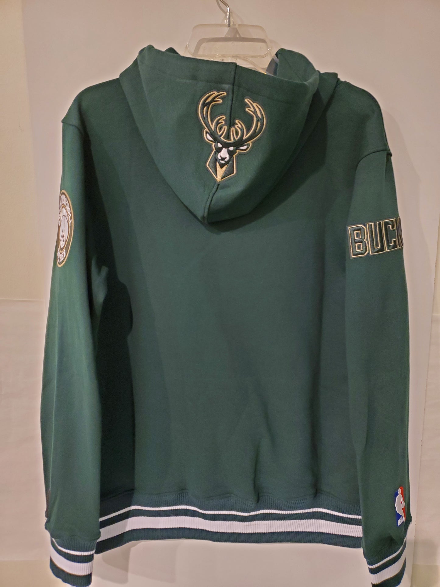 Milwaukee Bucks Old English Writing with Tan And black outlining