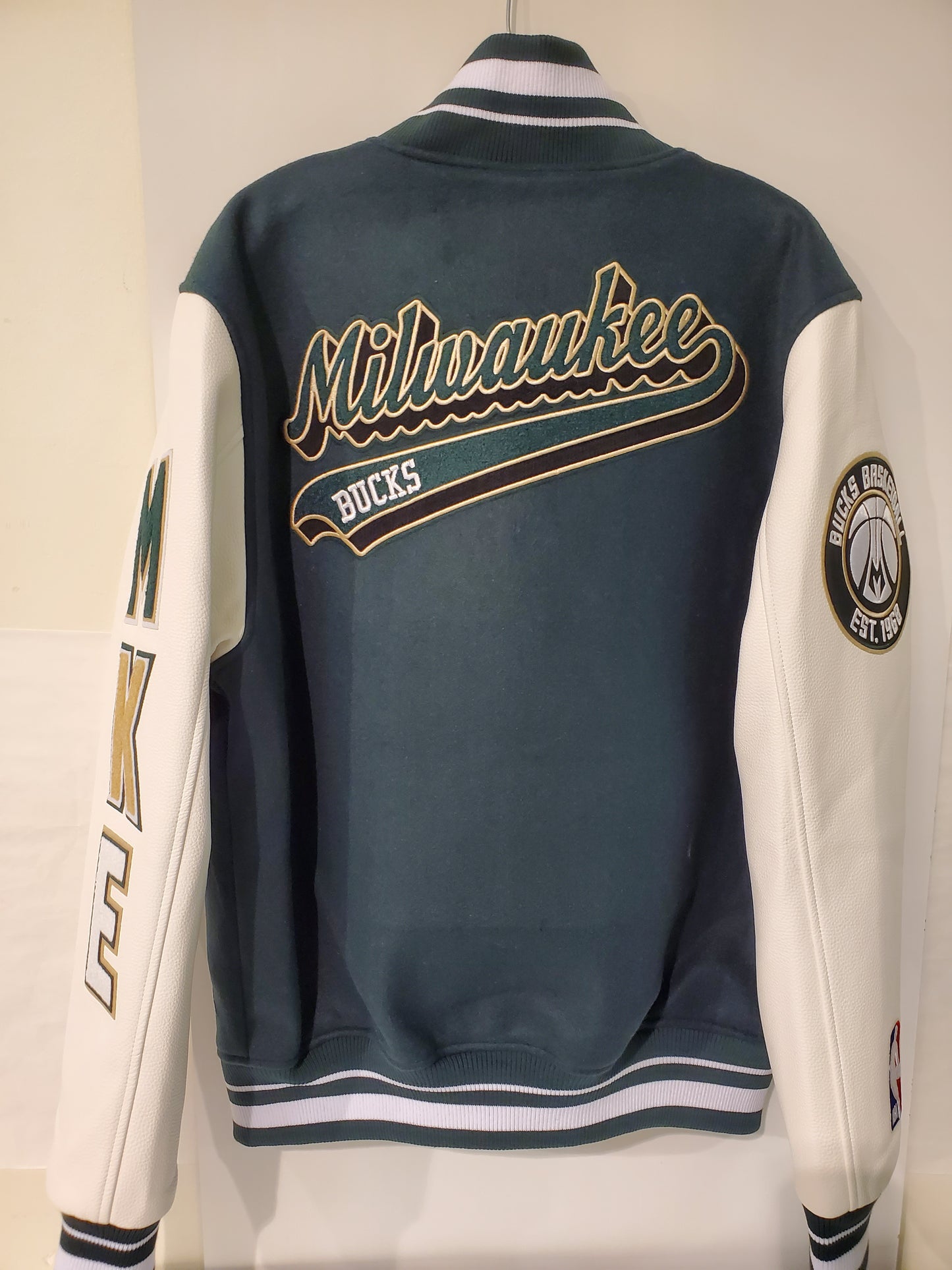 Milwaukee Bucks Green and White With MKE on the Arm