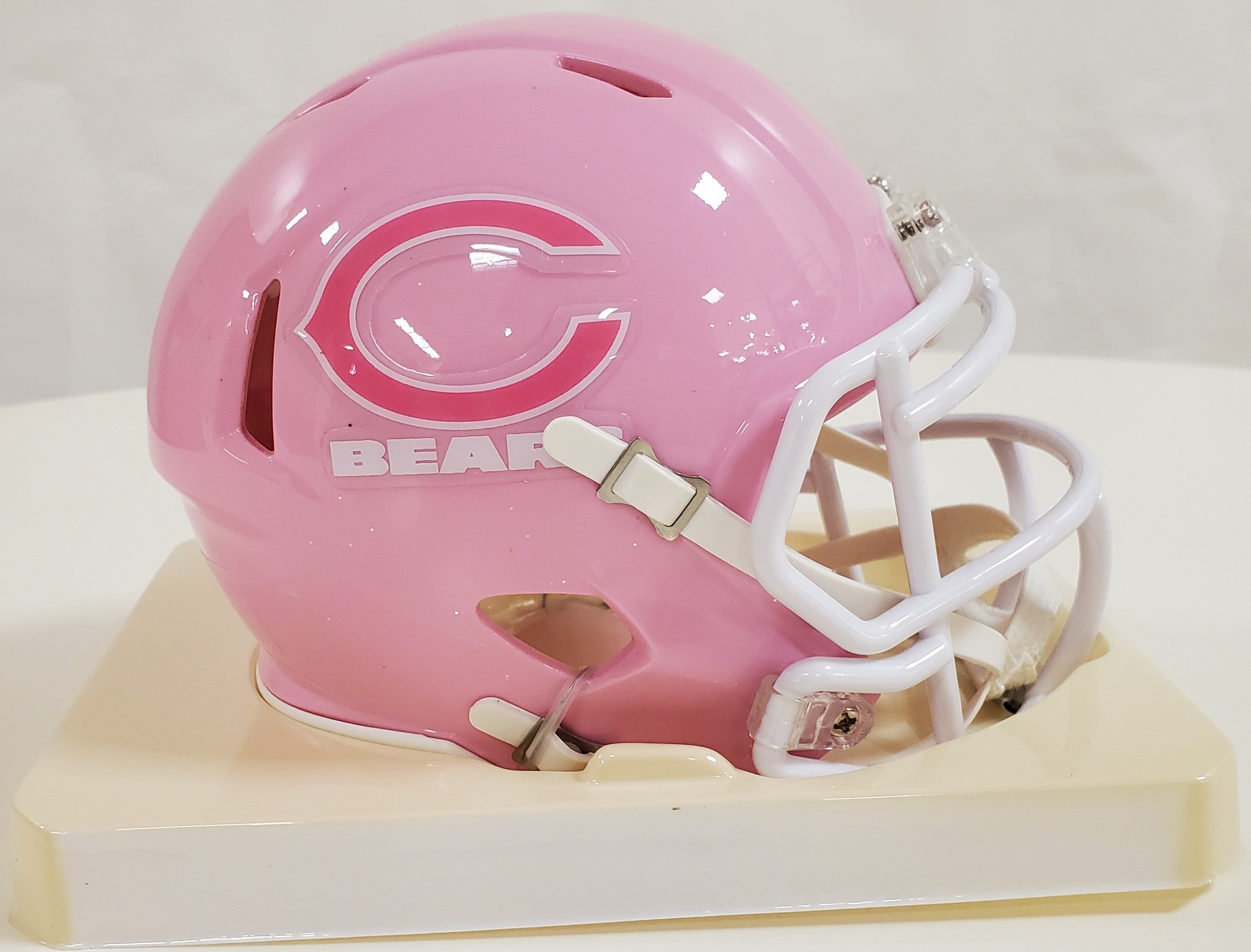 a pink football helmet Riddell Chicago Bears Pink Breast Cancer Mini Helmet – Sports Images & More LLC